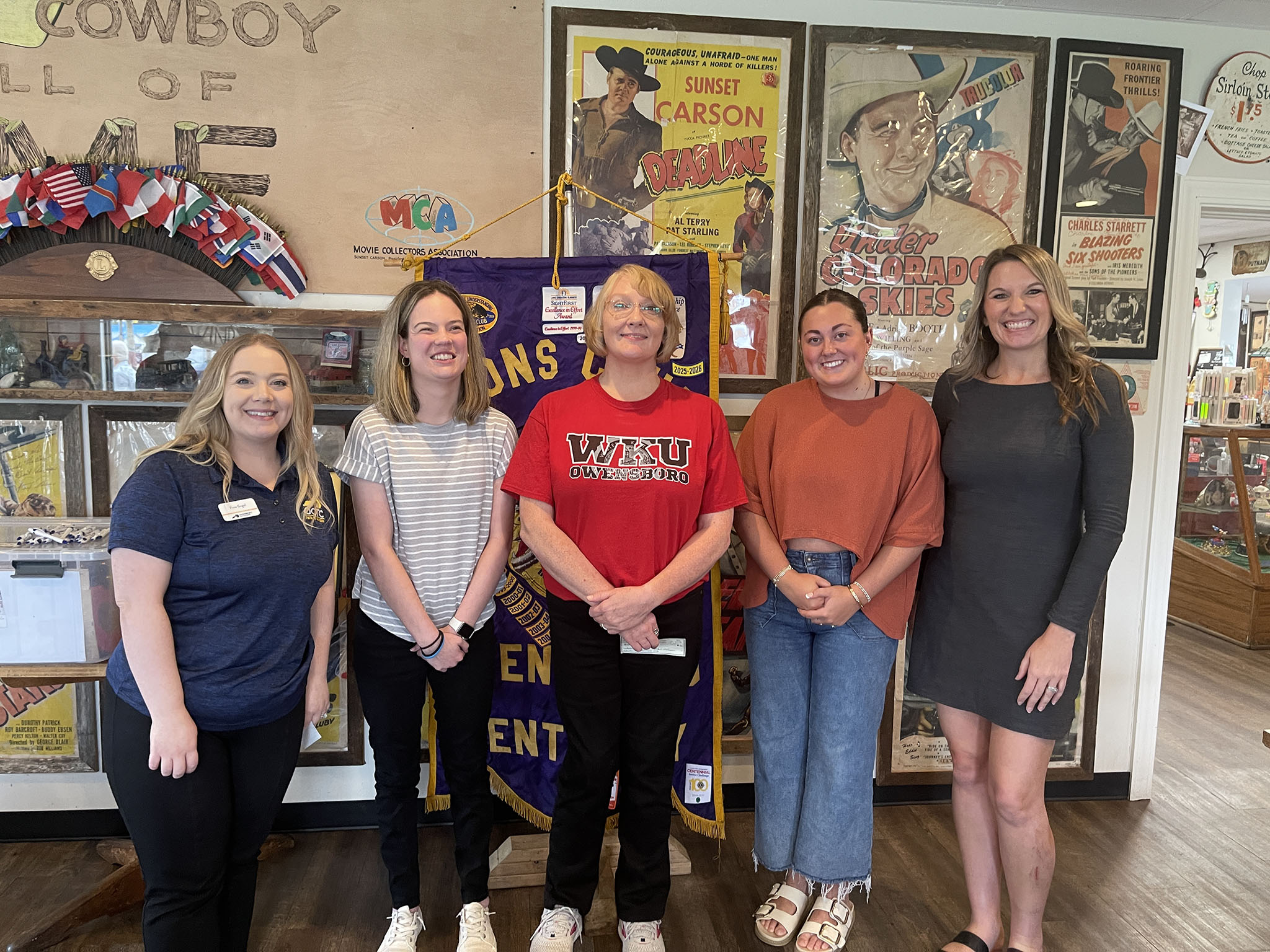 Scholarship recipients, college representatives and first VP Steve Johnson